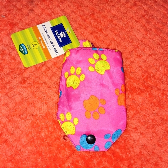Medium pink raincoat in a bag